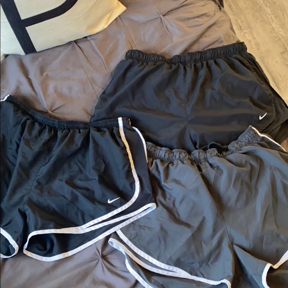 3 pairs of nike running shorts